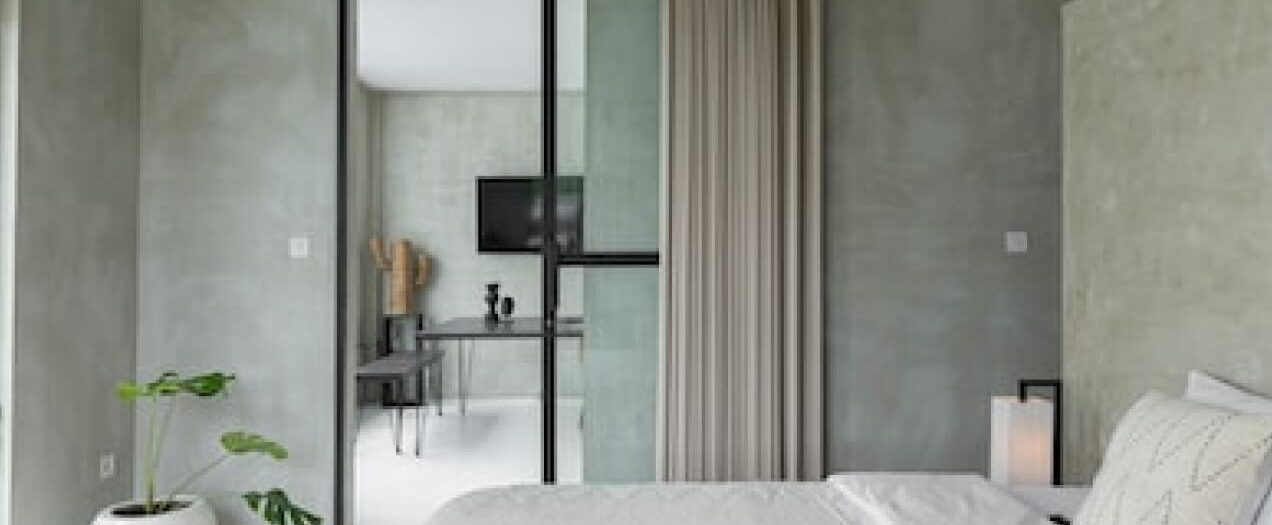 single family home bedroom with a sliding glass door