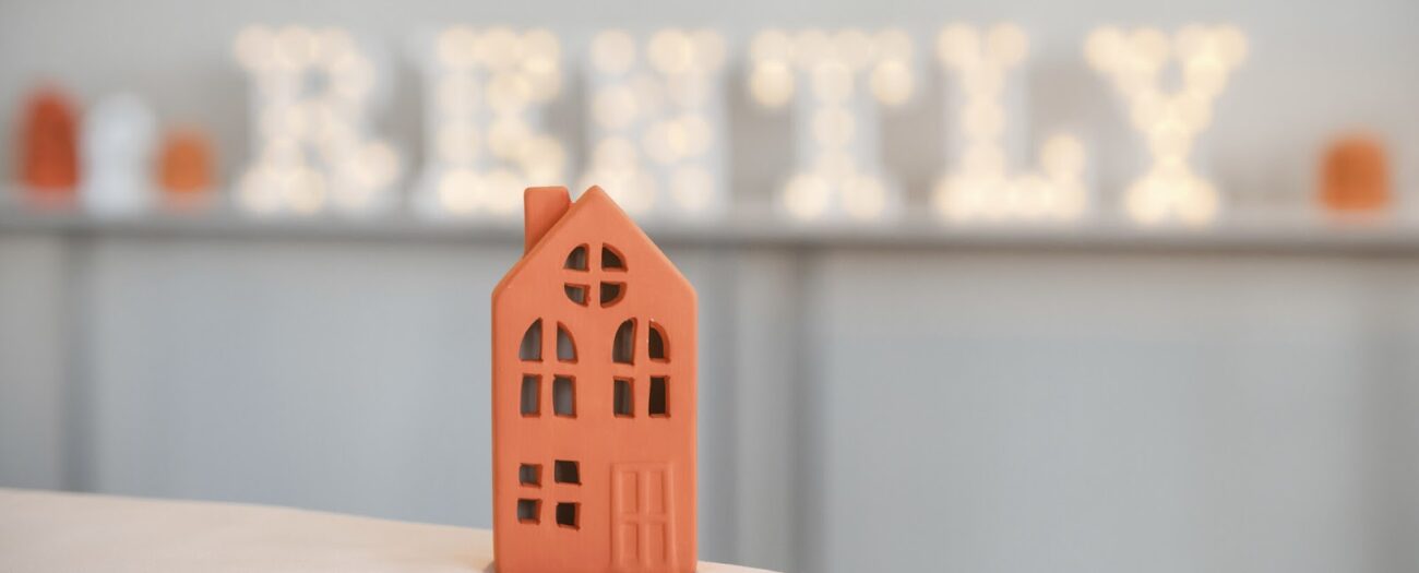 Hand made clay house representing the Tunnel to Tower Foundation at the Rently Summit 2023