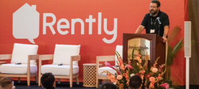 Rently CEO Merrick Lackner addressees the Rently Summit attendees